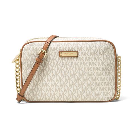 michael kors east west jet set signature vanilla|Jet Set Large Logo Crossbody Bag .